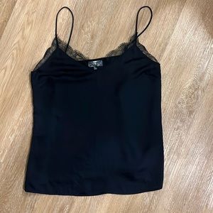 Stunning navy blue silk tank top with lace accent!